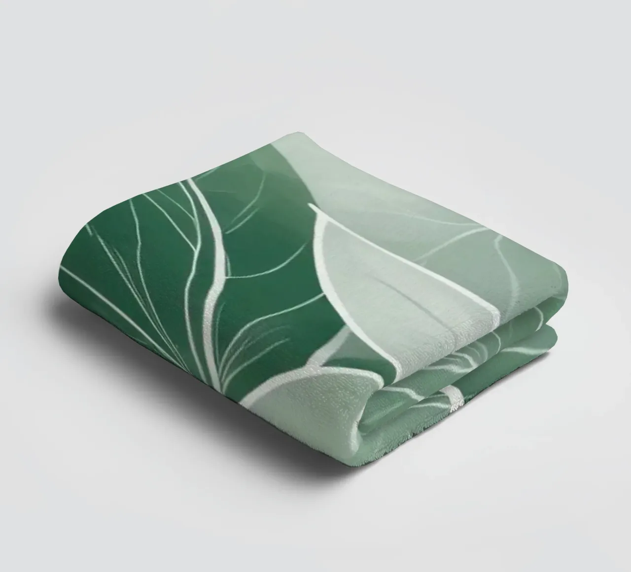 Soft green leaves create a calming botanical pattern towel by DesignDoodle