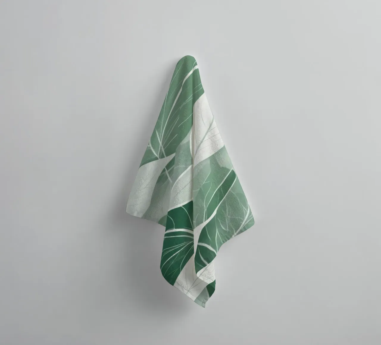 Soft green leaves create a calming botanical pattern towel by DesignDoodle