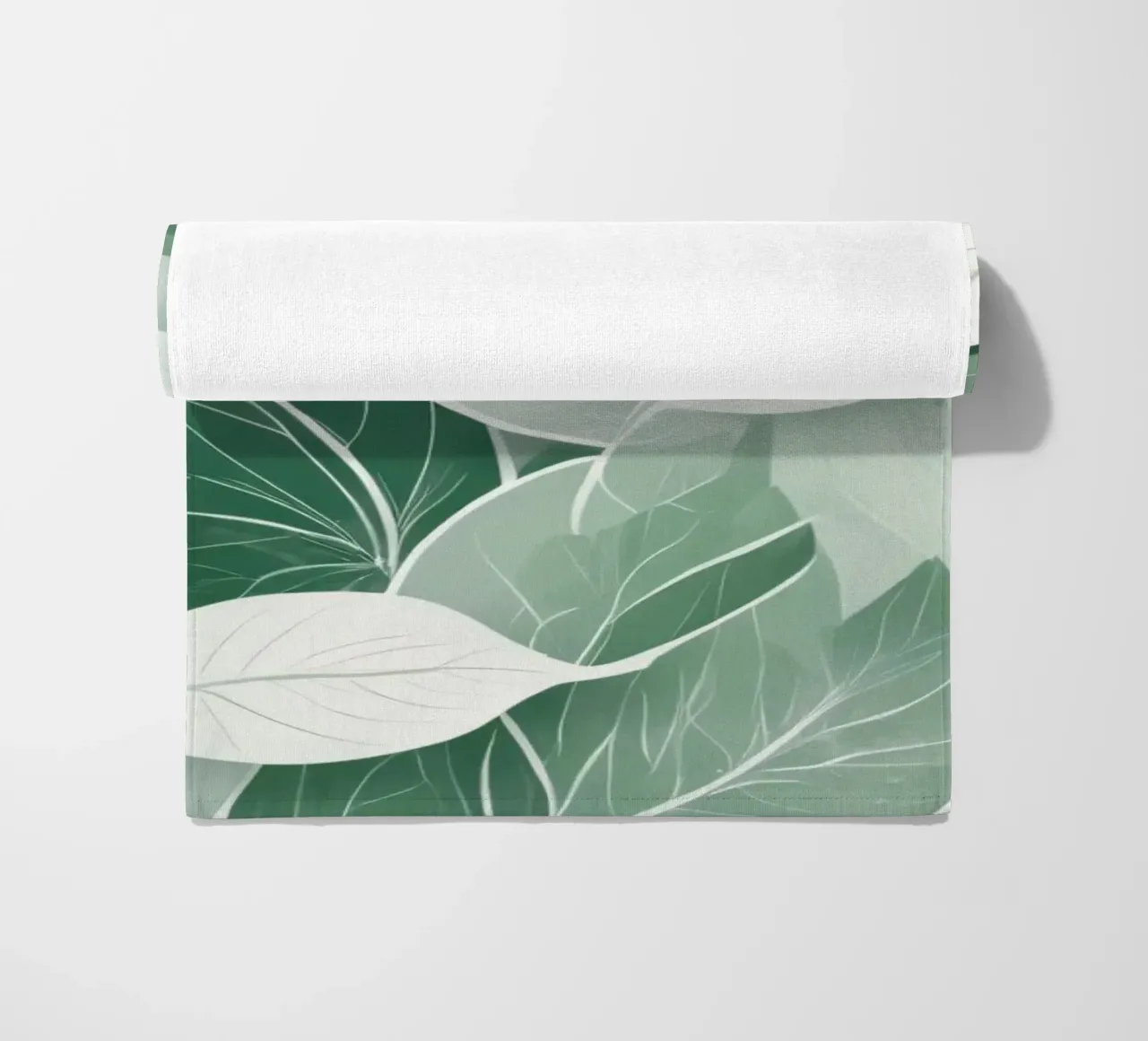 Soft green leaves create a calming botanical pattern beach towel by DesignDoodle