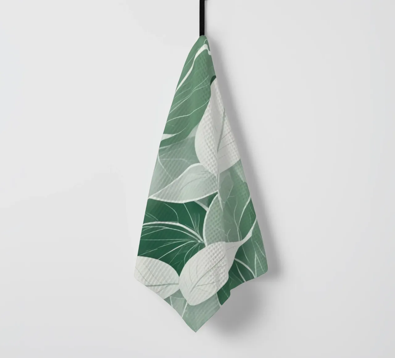 Soft green leaves create a calming botanical pattern tea towel by DesignDoodle