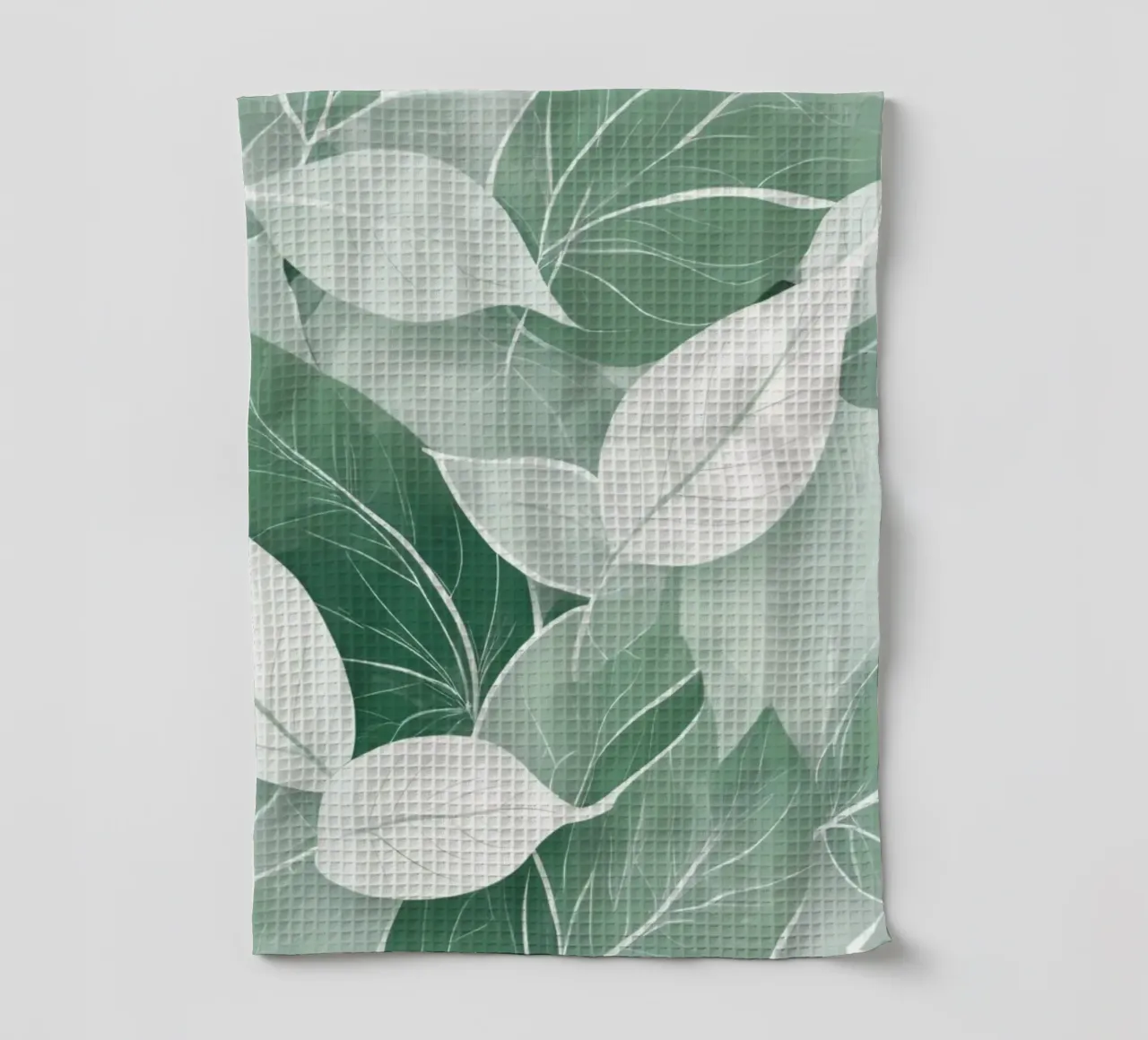 Soft green leaves create a calming botanical pattern tea towel by DesignDoodle