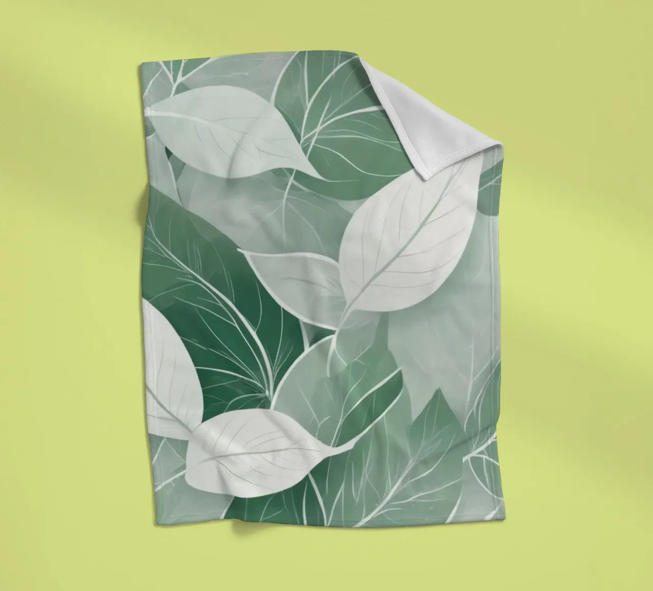 Soft green leaves create a calming botanical pattern fleece blanket by DesignDoodle