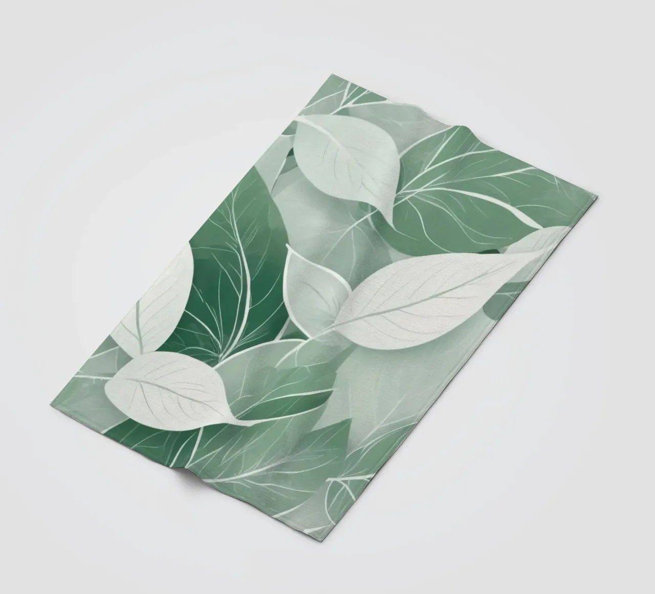 Soft green leaves create a calming botanical pattern fleece blanket by DesignDoodle