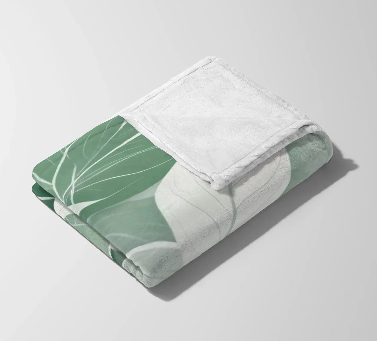 Soft green leaves create a calming botanical pattern fleece blanket by DesignDoodle