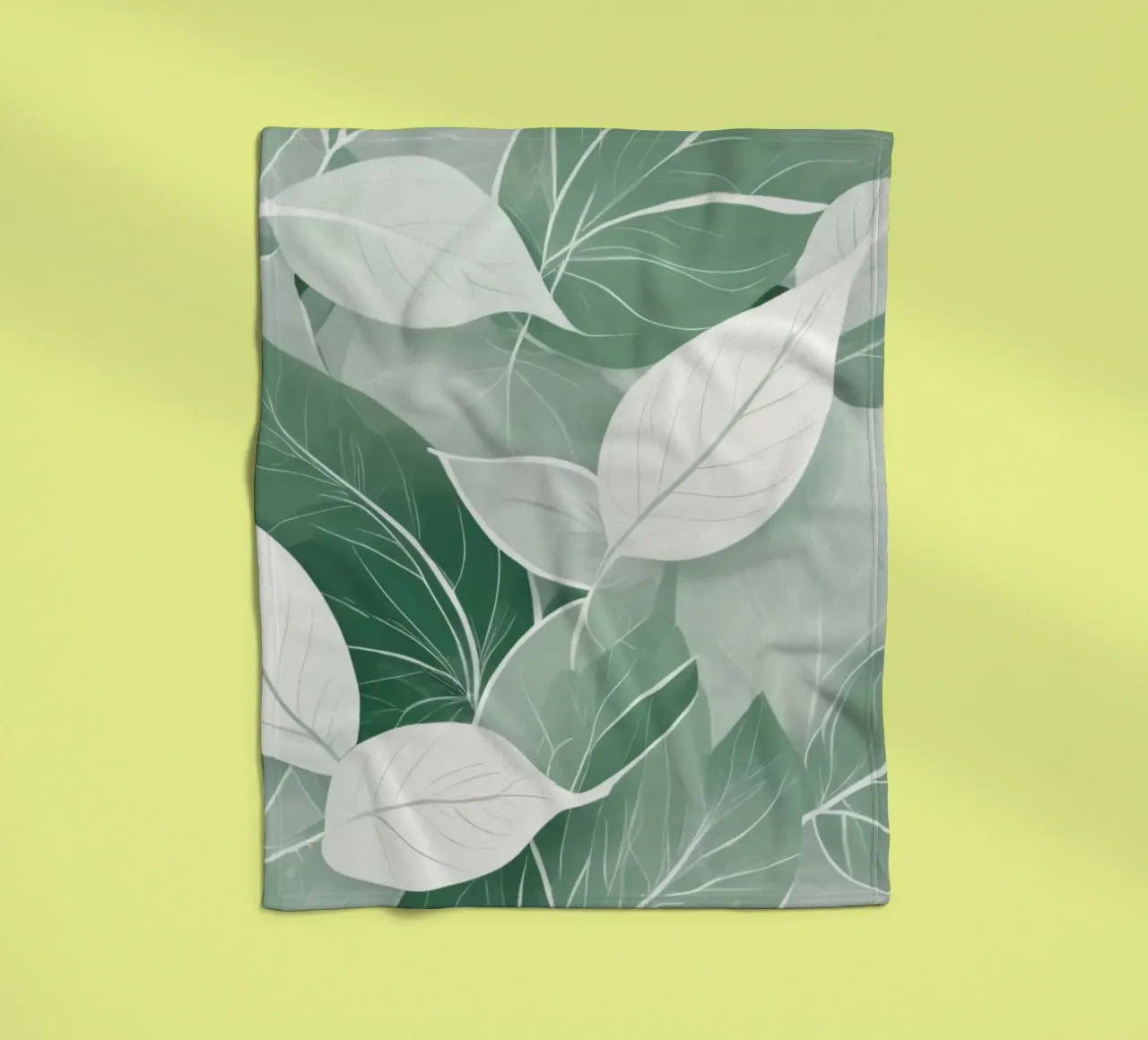 Soft green leaves create a calming botanical pattern fleece blanket by DesignDoodle