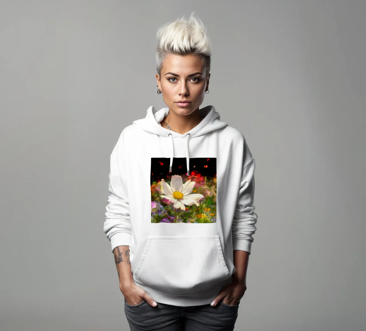 une fleur blanche brille au centre d'un champ de fleurs sweat à capuche de NA/MO