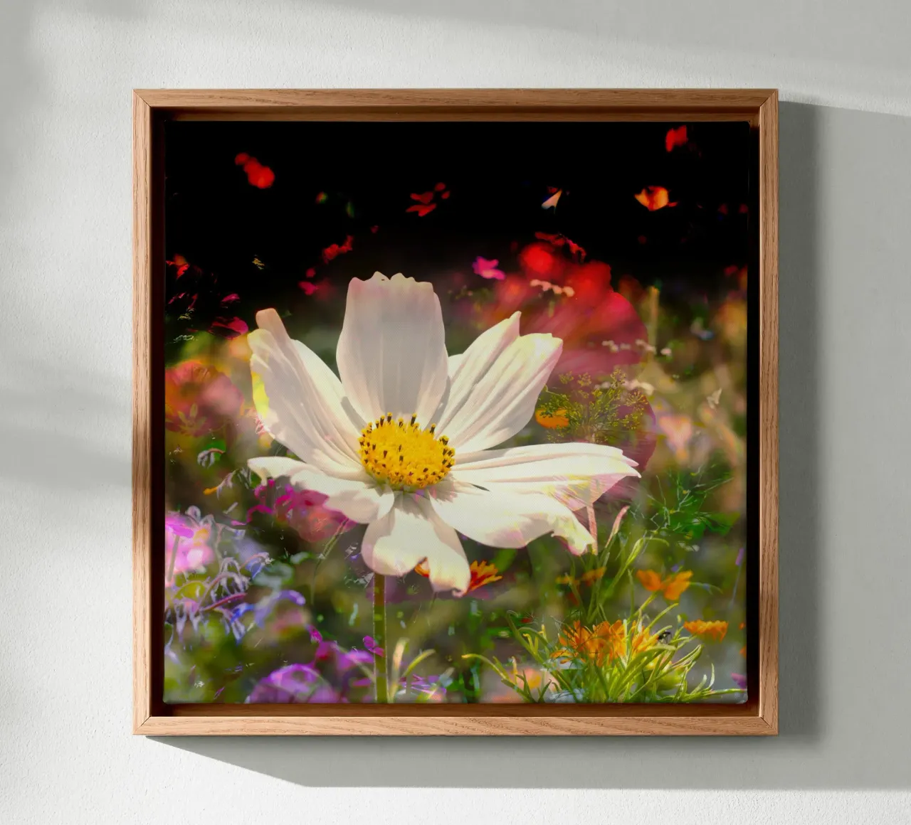 white flower stands brightly in the centre of a field of flowers canvas with Floater frame by NA/MO