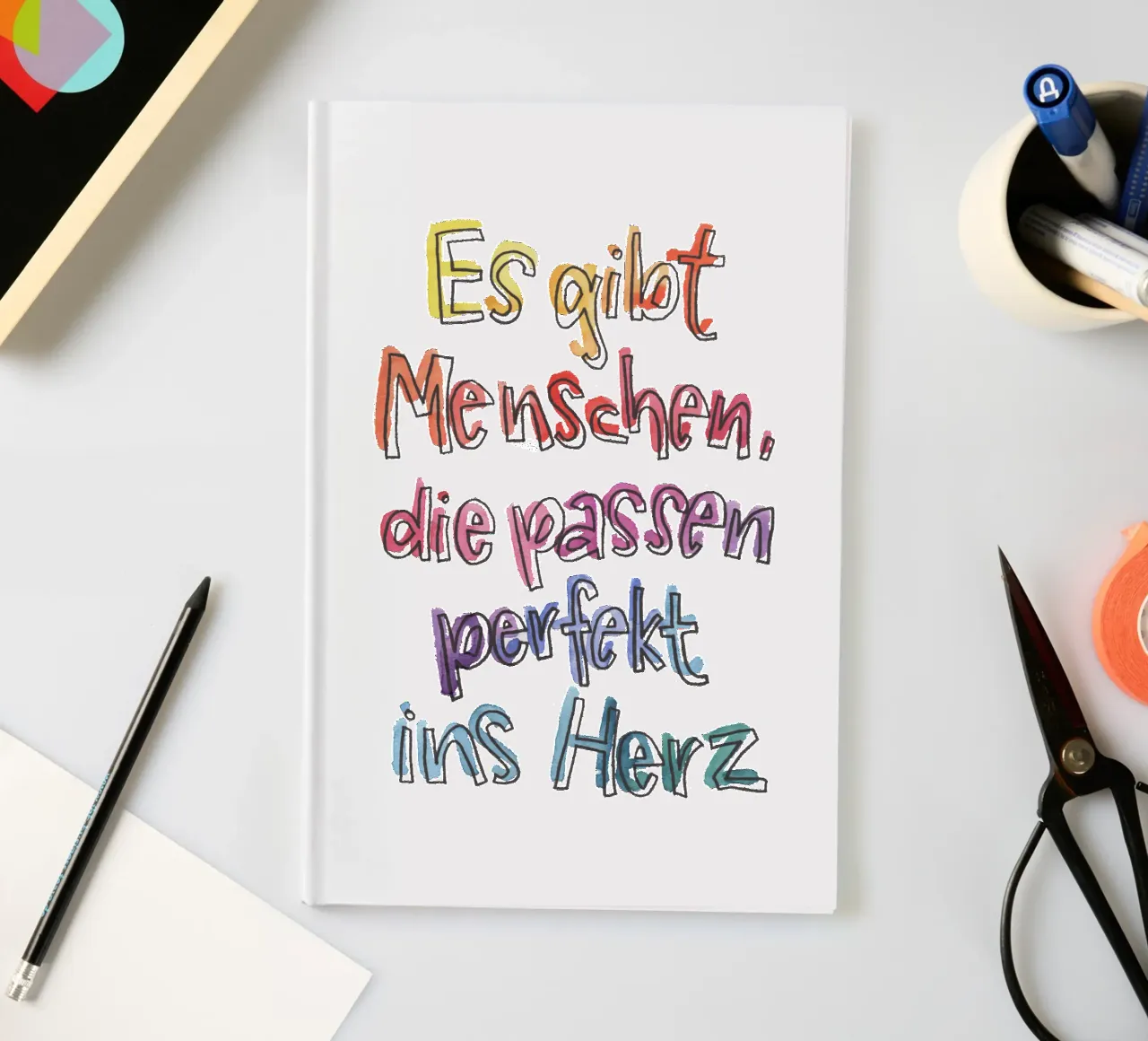 Perfekt ins Herz Regenbogen notebook by Brushmeetspaper