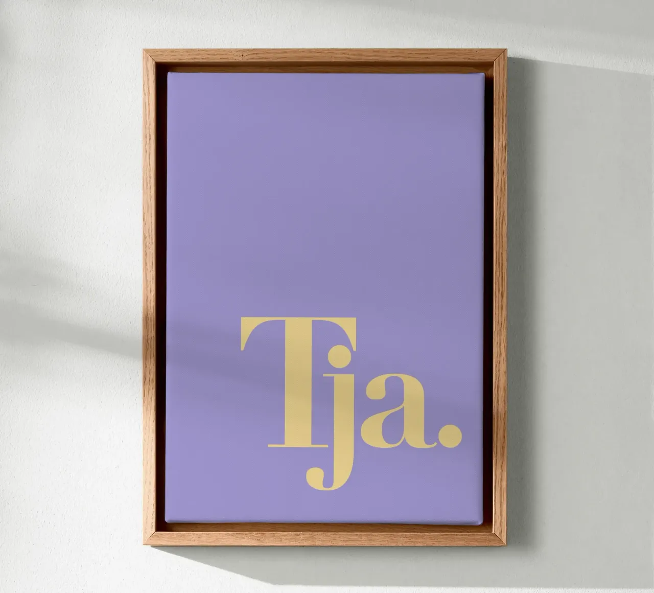 Typo Print Tja - Minimalist typography in pastel colours canvas with Floater frame by Tine Taler