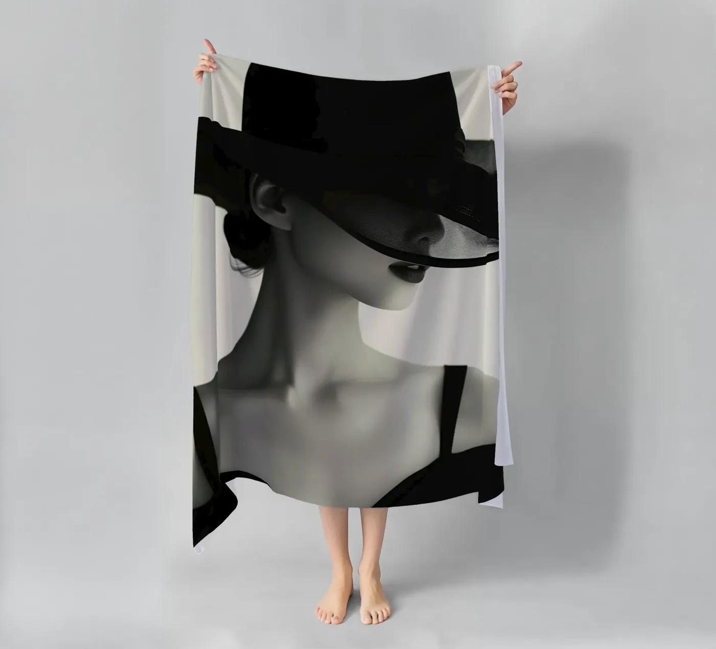 Donne e cappello nero telo mare da Lorraine Mooore