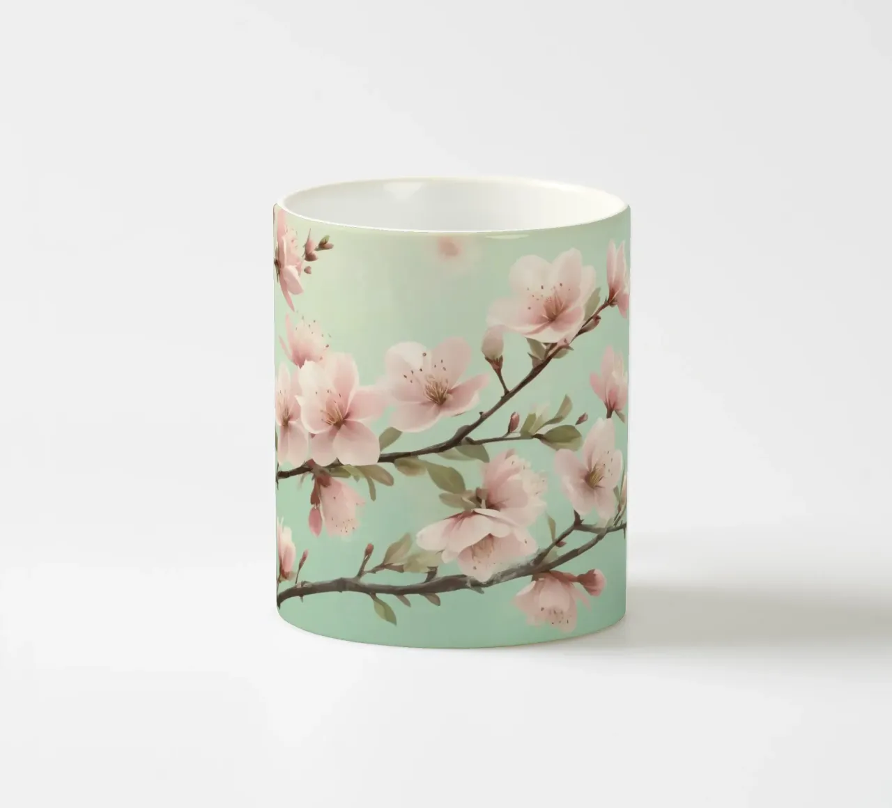Blossoms blooming on branches under soft turquoise sky ceramic mug by DesignDoodle