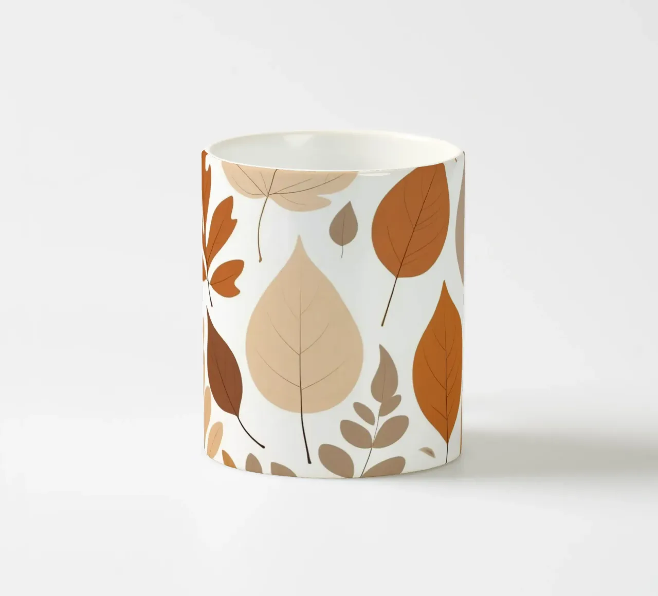 Foglie d'autunno di varie forme e colori disposte tazza in ceramica da DesignDoodle