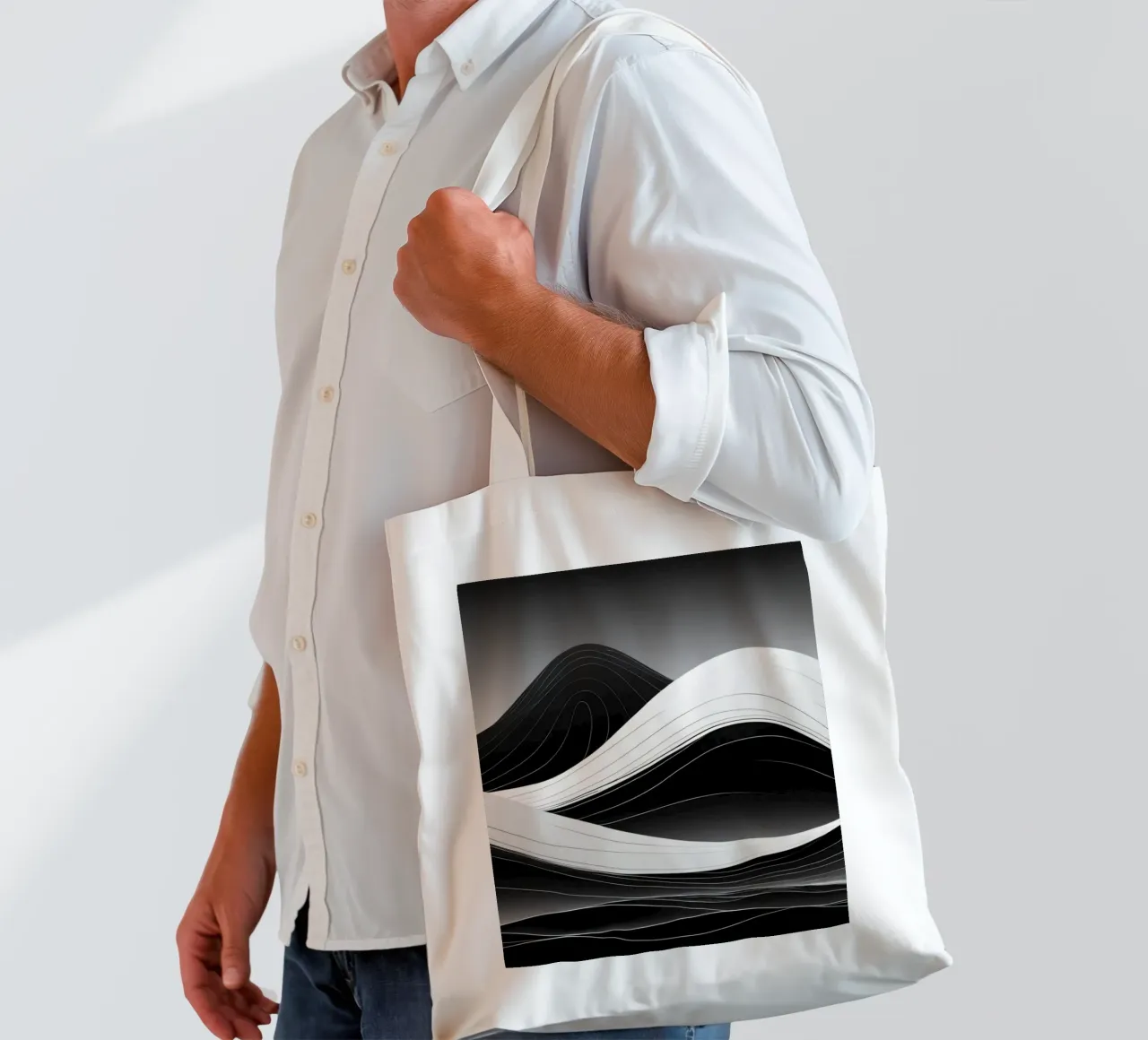 Dynamic black and white waves creating an abstract landscape tote bag by DesignDoodle
