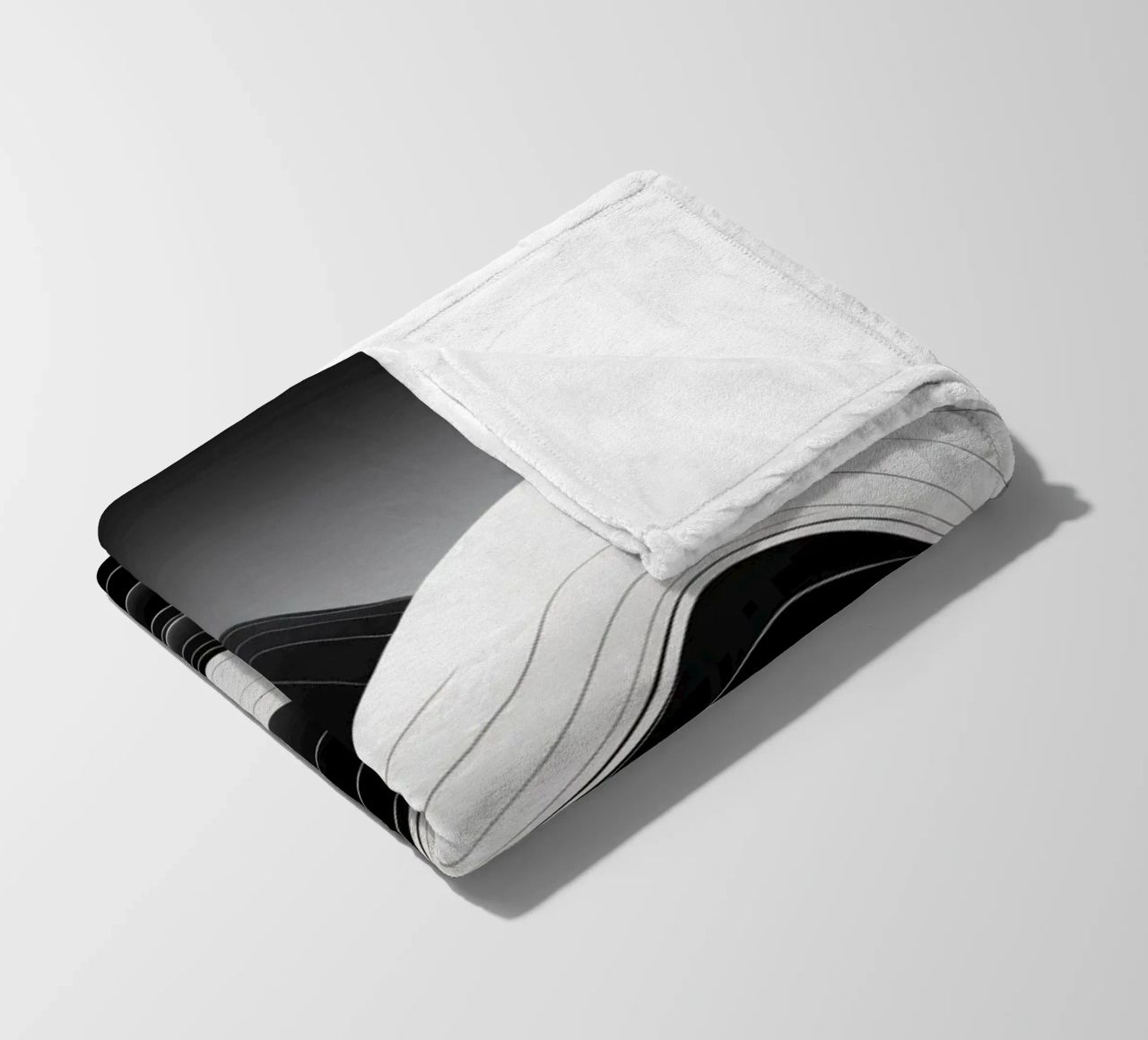 Dynamic black and white waves creating an abstract landscape fleece blanket by DesignDoodle