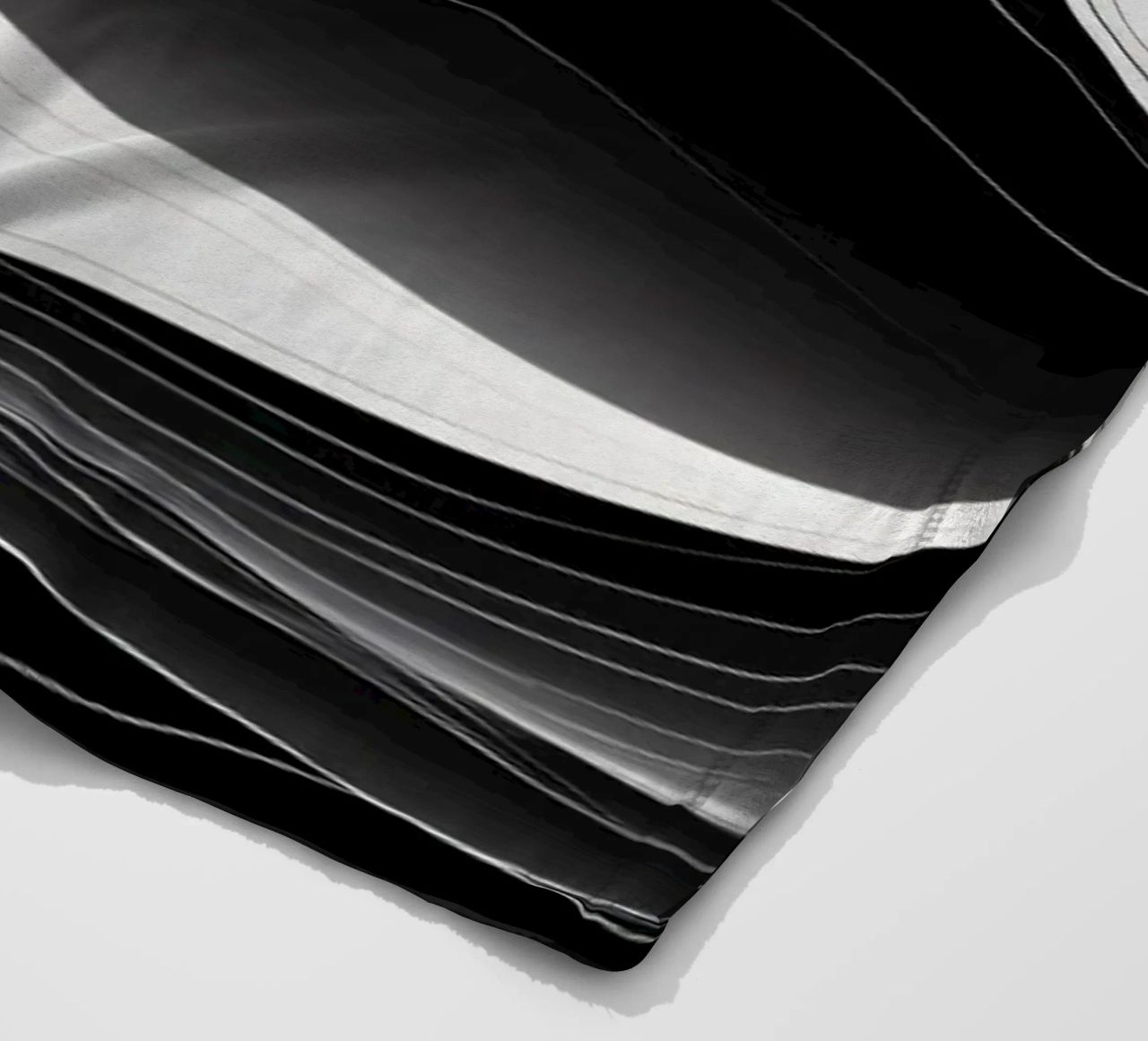 Dynamic black and white waves creating an abstract landscape fleece blanket by DesignDoodle