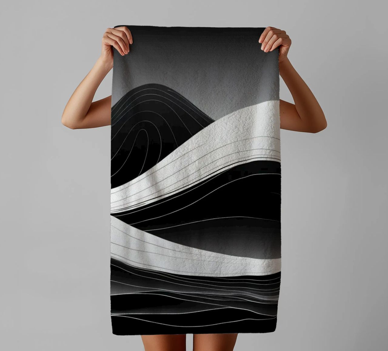 Dynamic black and white waves creating an abstract landscape towel by DesignDoodle
