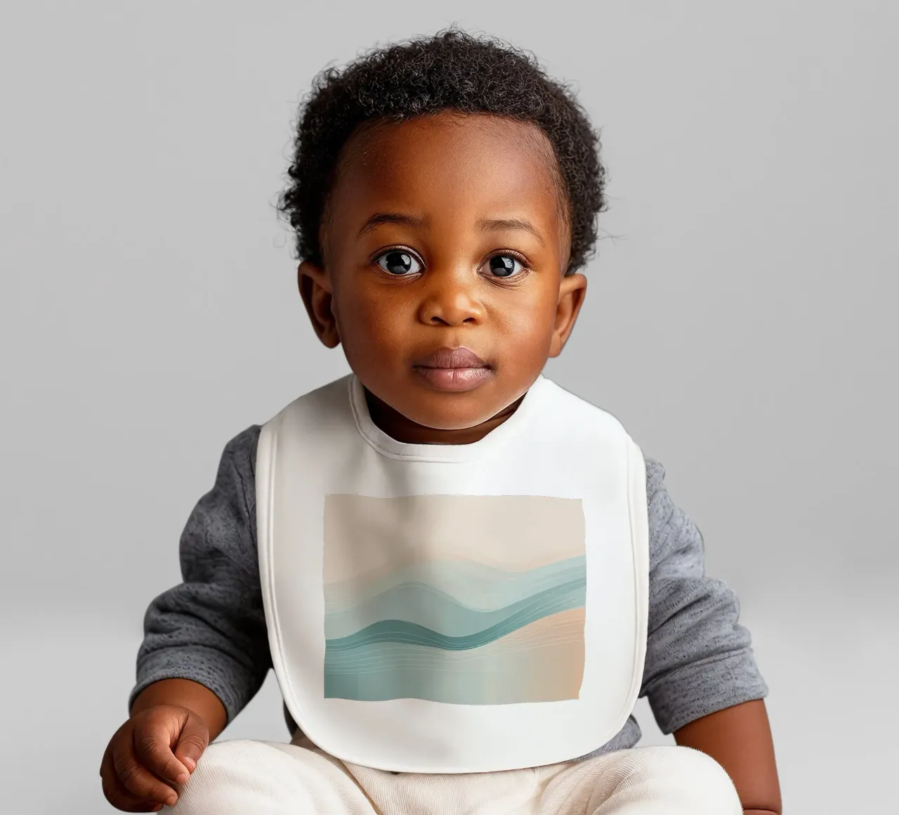 Soft waves of color blend harmoniously in an abstract design baby bib by DesignDoodle
