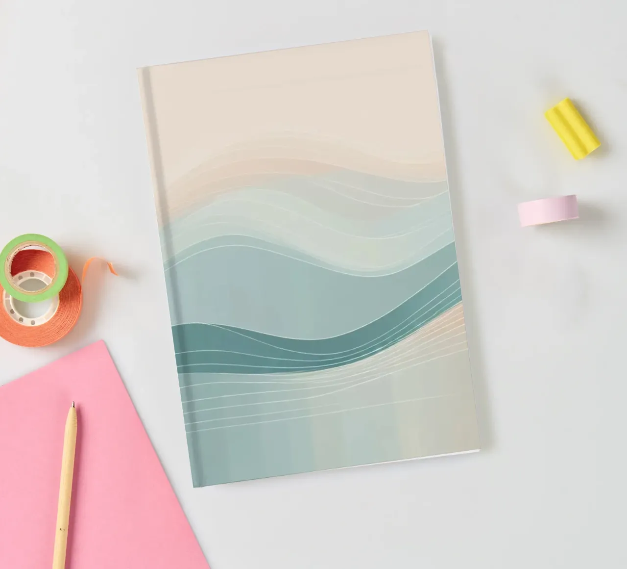 Soft waves of color blend harmoniously in an abstract design notebook by DesignDoodle