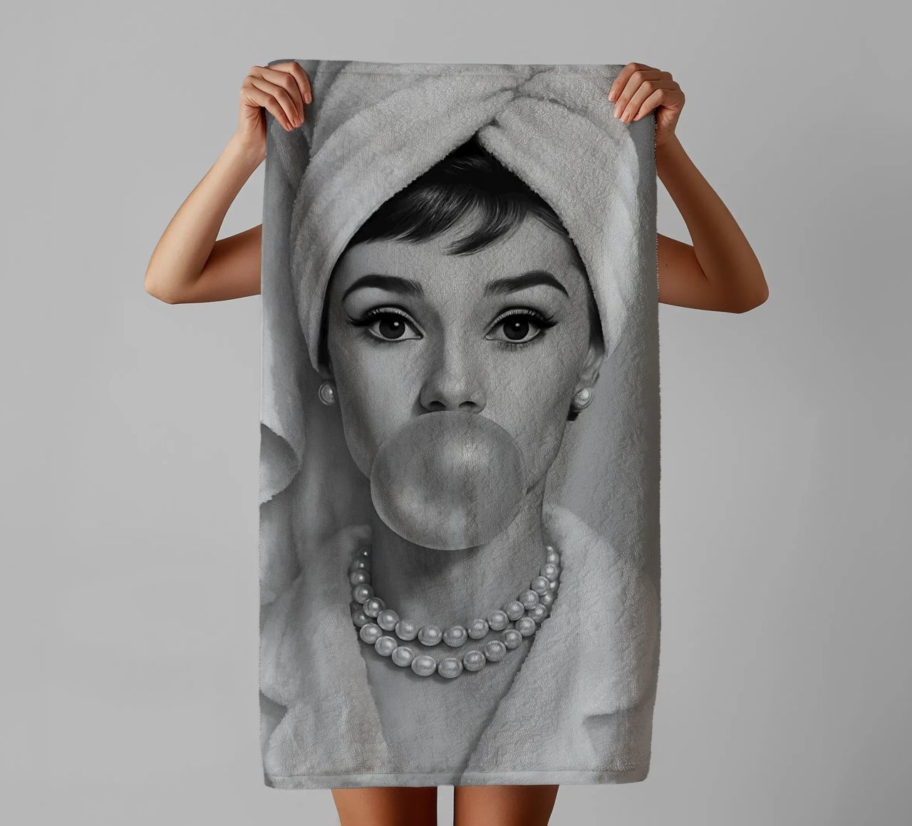 Audrey Hepburn Bubble Gum Black And White towel by ARTOMATIC