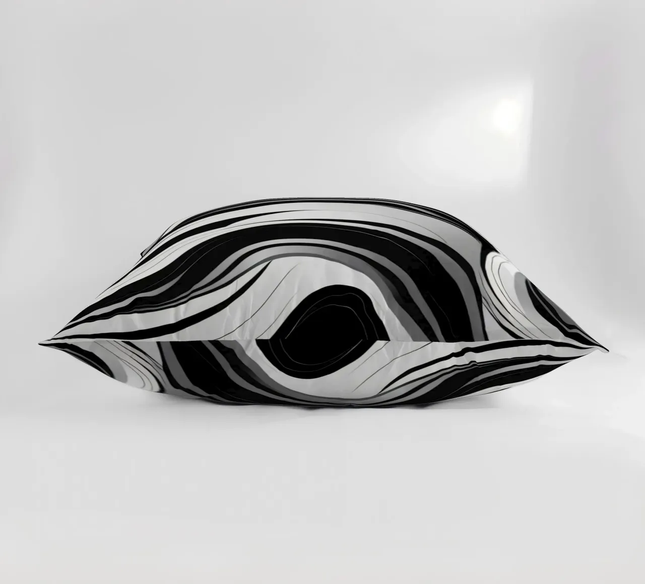 Swirling black and white abstract design with dynamic lines decorative cushion by DesignDoodle
