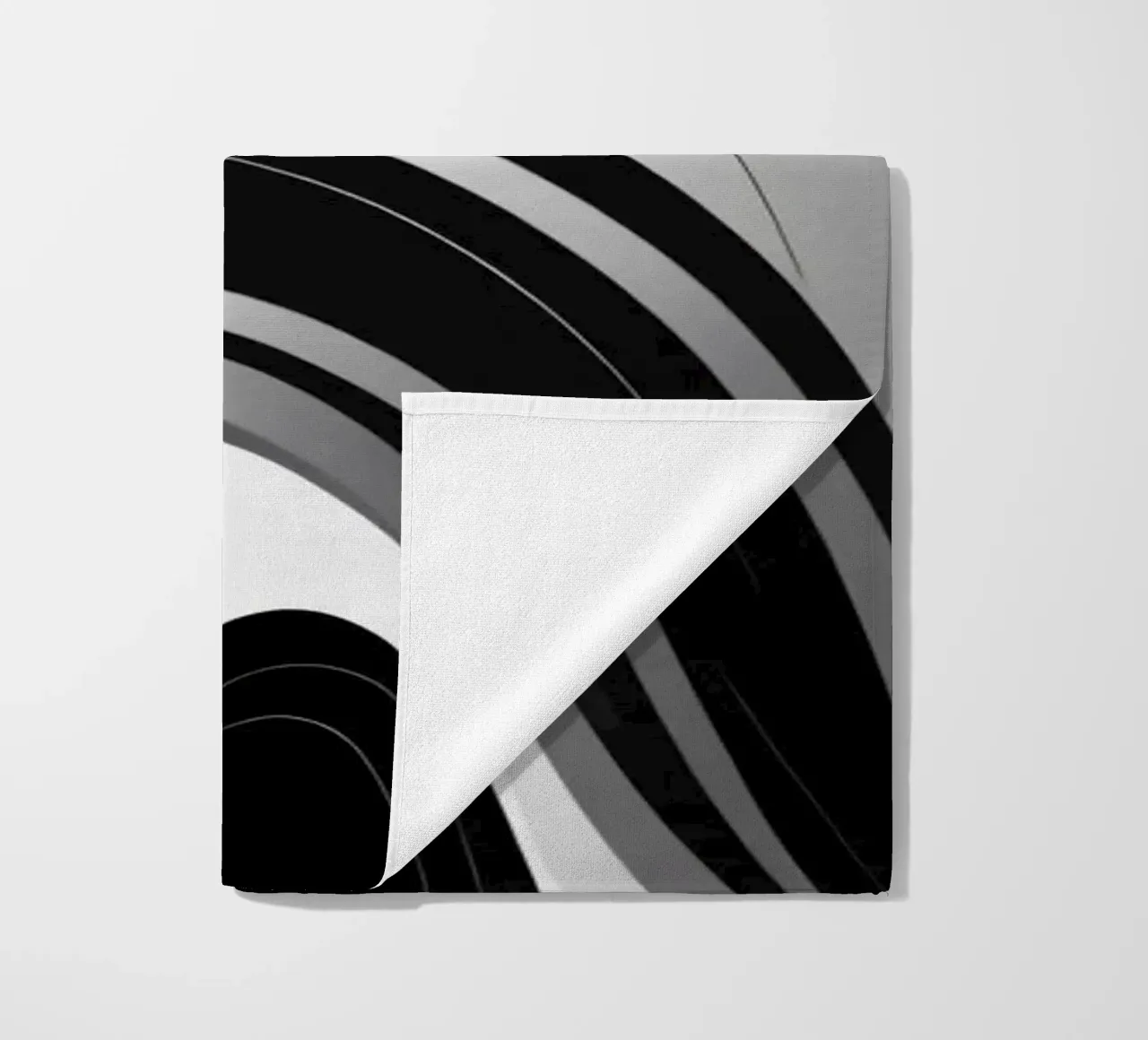 Swirling black and white abstract design with dynamic lines beach towel by DesignDoodle