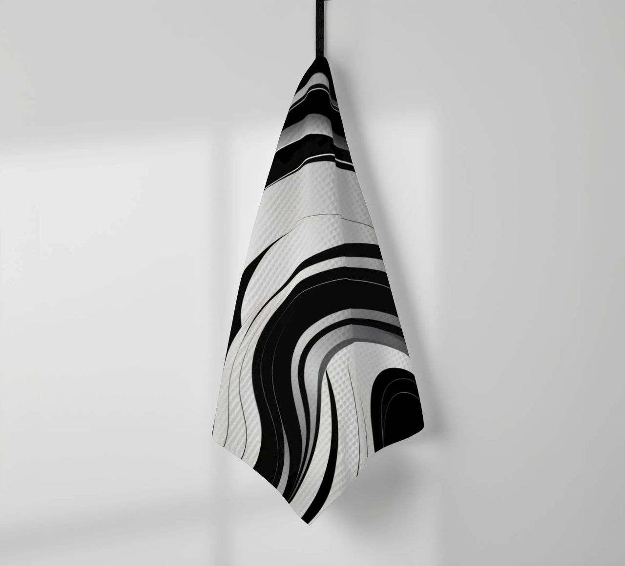 Swirling black and white abstract design with dynamic lines tea towel by DesignDoodle