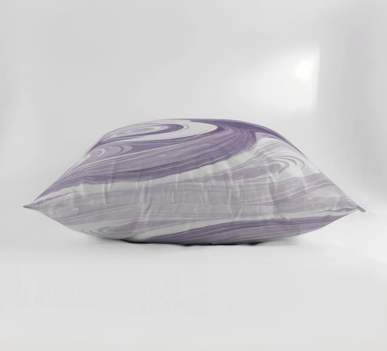 Swirling patterns in shades of purple create a calming room decorative cushion by DesignDoodle