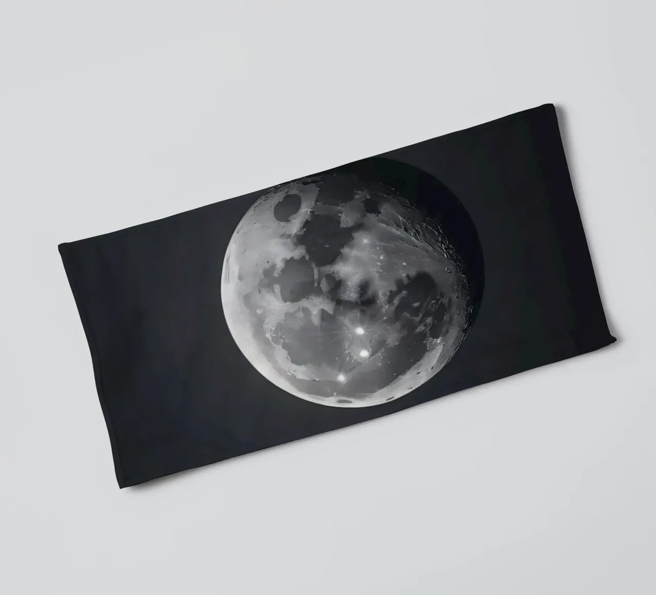 Full moon illuminated in a clear night sky showcasing lunar towel by DesignDoodle