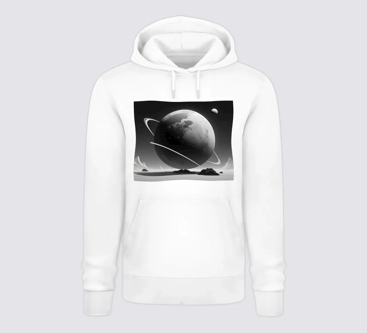 planet with rings hovering over a desolate landscape under a hoodie by DesignDoodle
