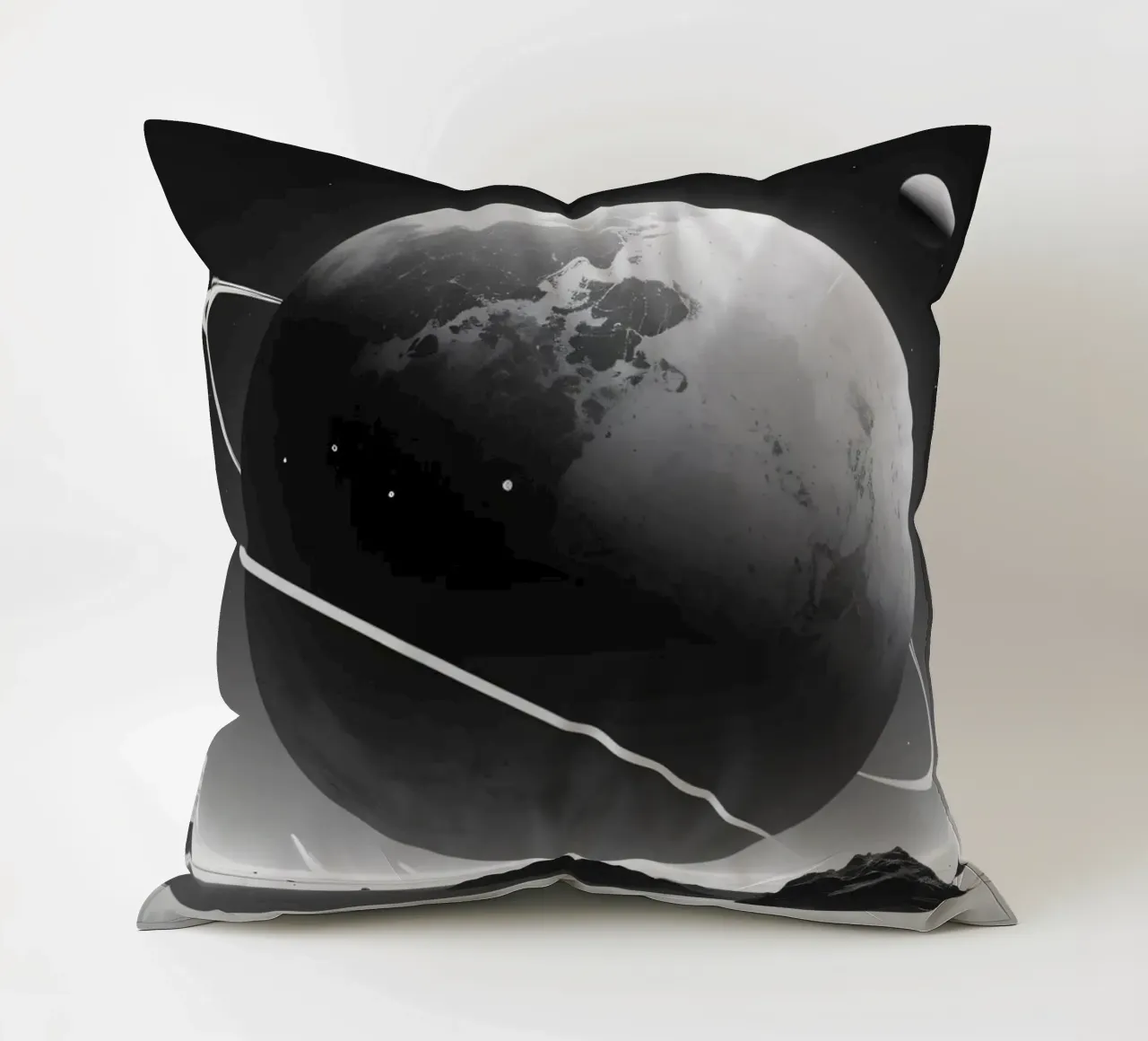 planet with rings hovering over a desolate landscape under a decorative cushion by DesignDoodle