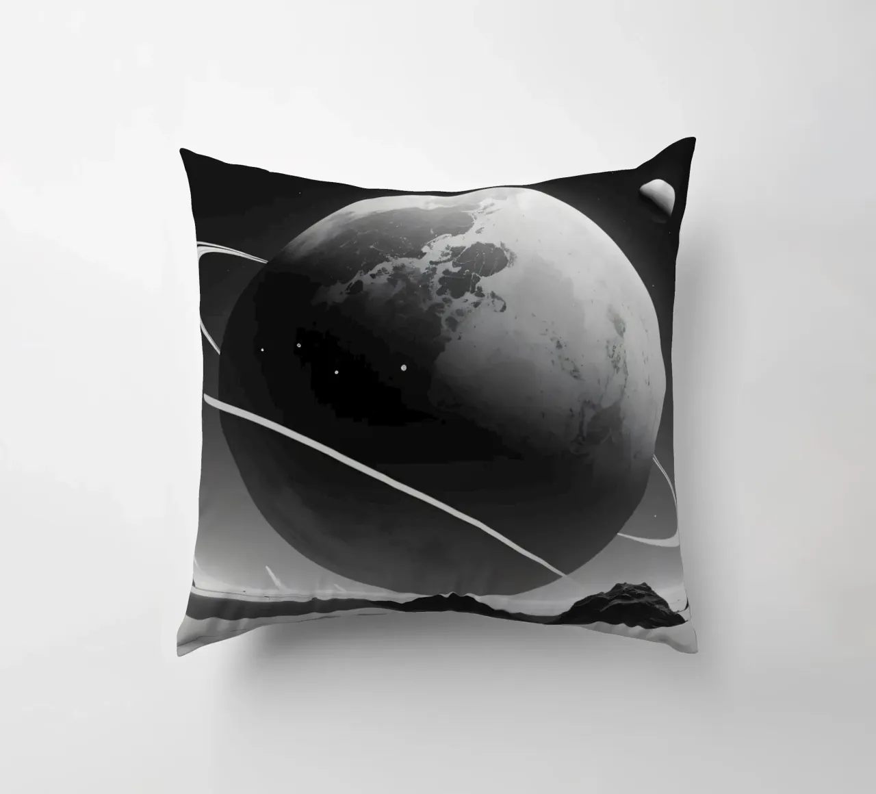 planet with rings hovering over a desolate landscape under a decorative cushion by DesignDoodle