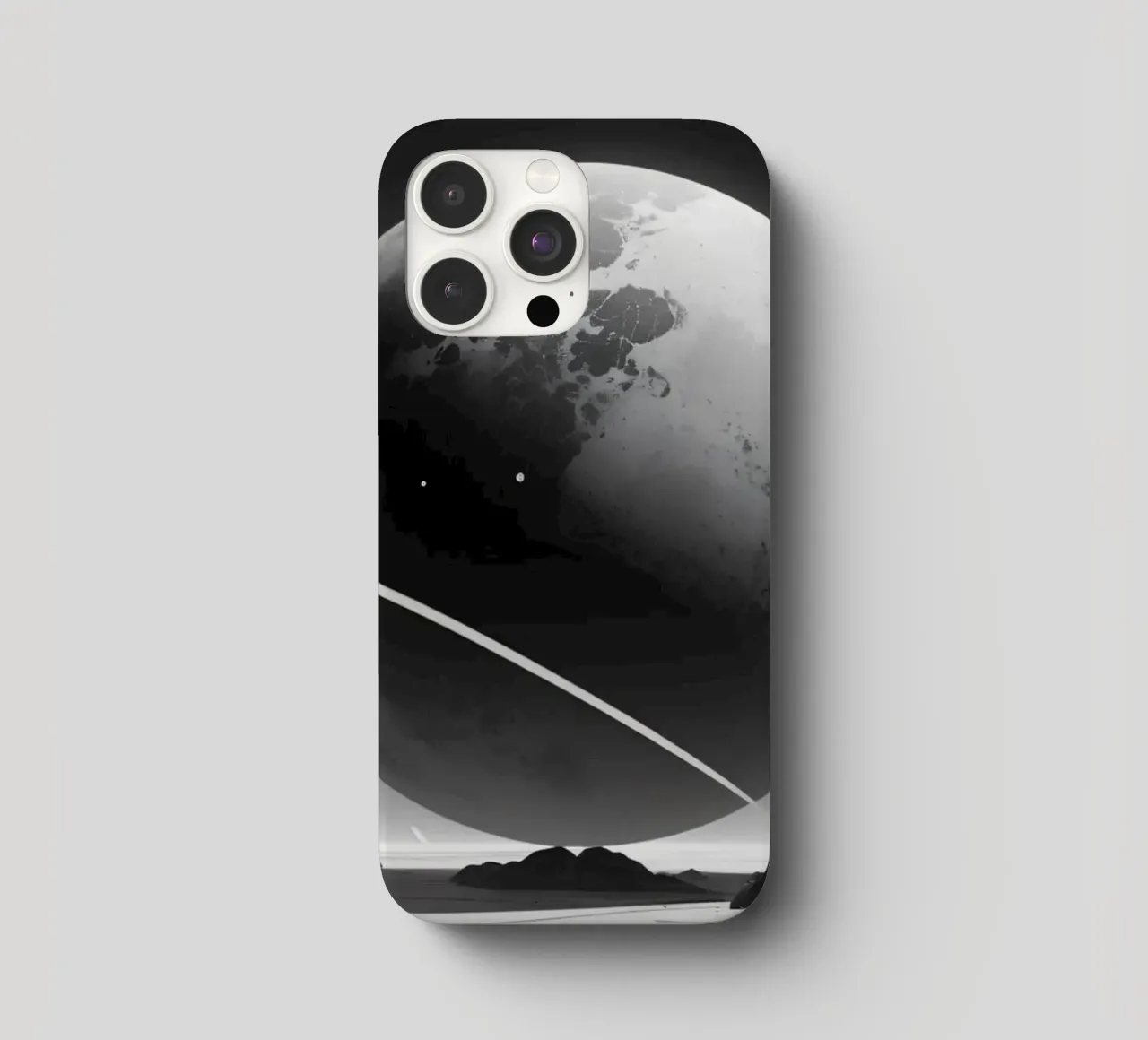 planet with rings hovering over a desolate landscape under a iphone case by DesignDoodle