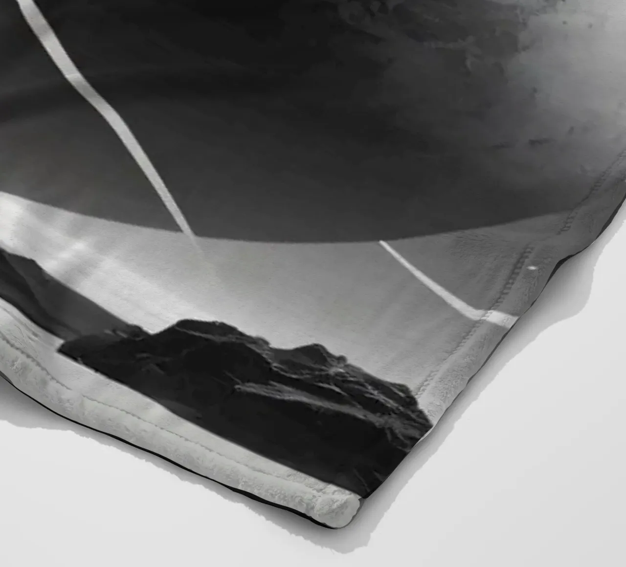 planet with rings hovering over a desolate landscape under a fleece blanket by DesignDoodle