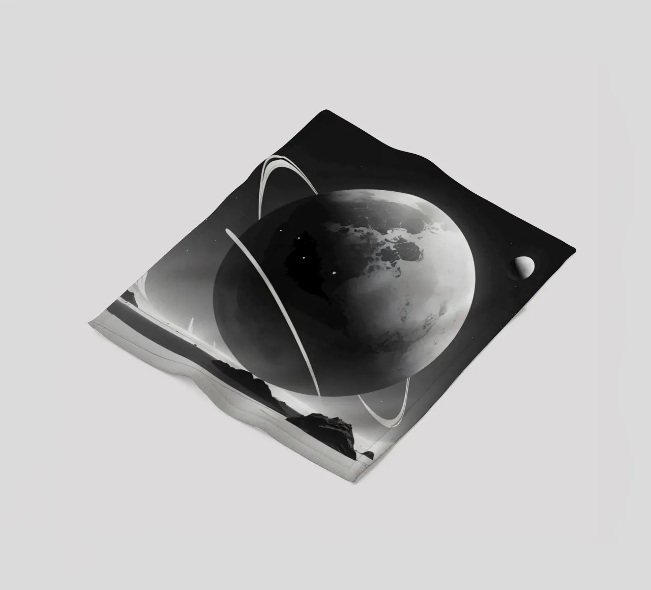 planet with rings hovering over a desolate landscape under a fleece blanket by DesignDoodle