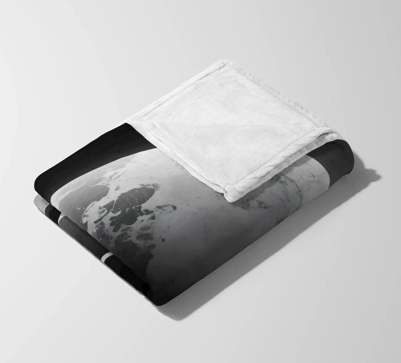 planet with rings hovering over a desolate landscape under a fleece blanket by DesignDoodle