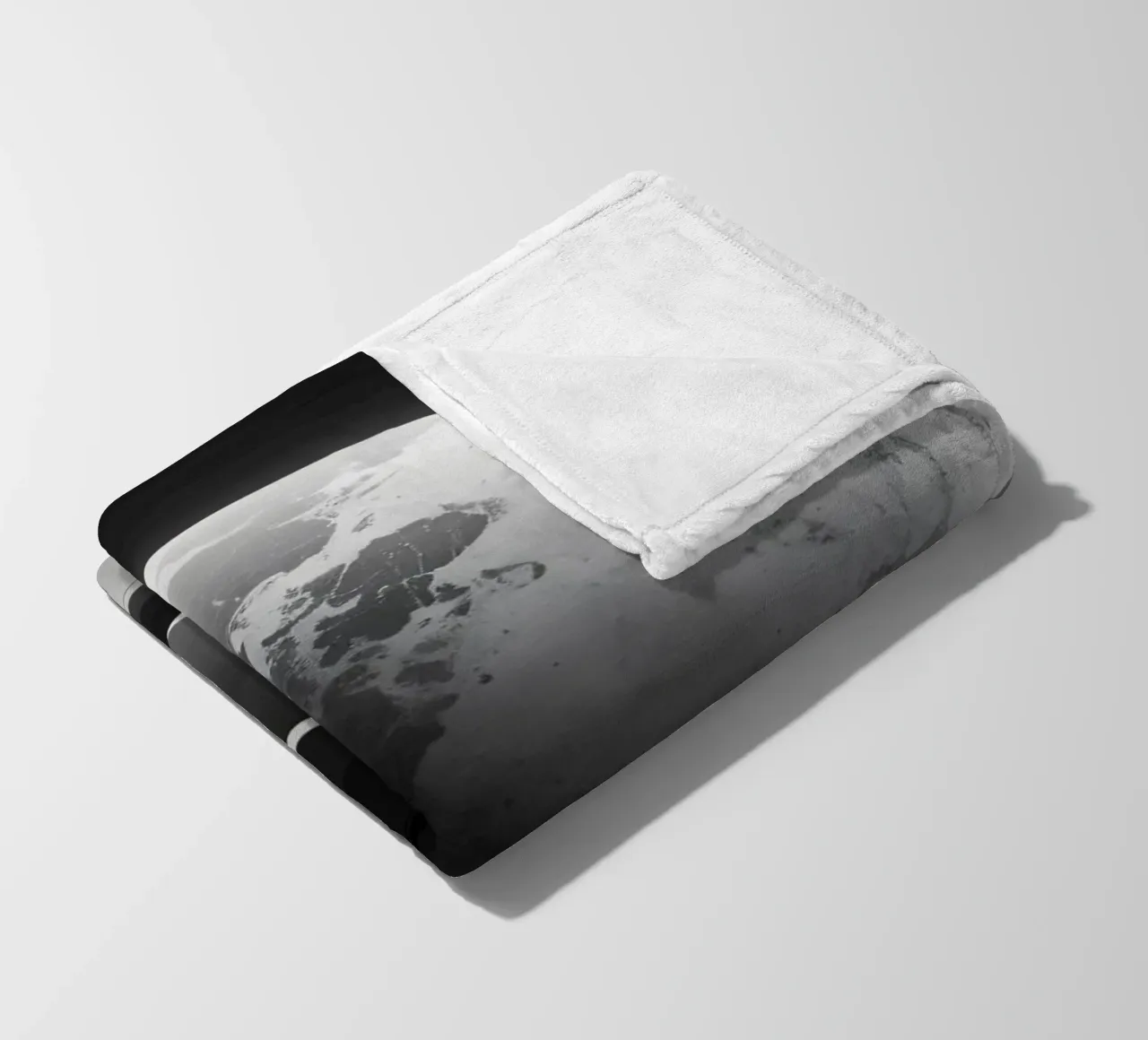 planet with rings hovering over a desolate landscape under a fleece blanket by DesignDoodle