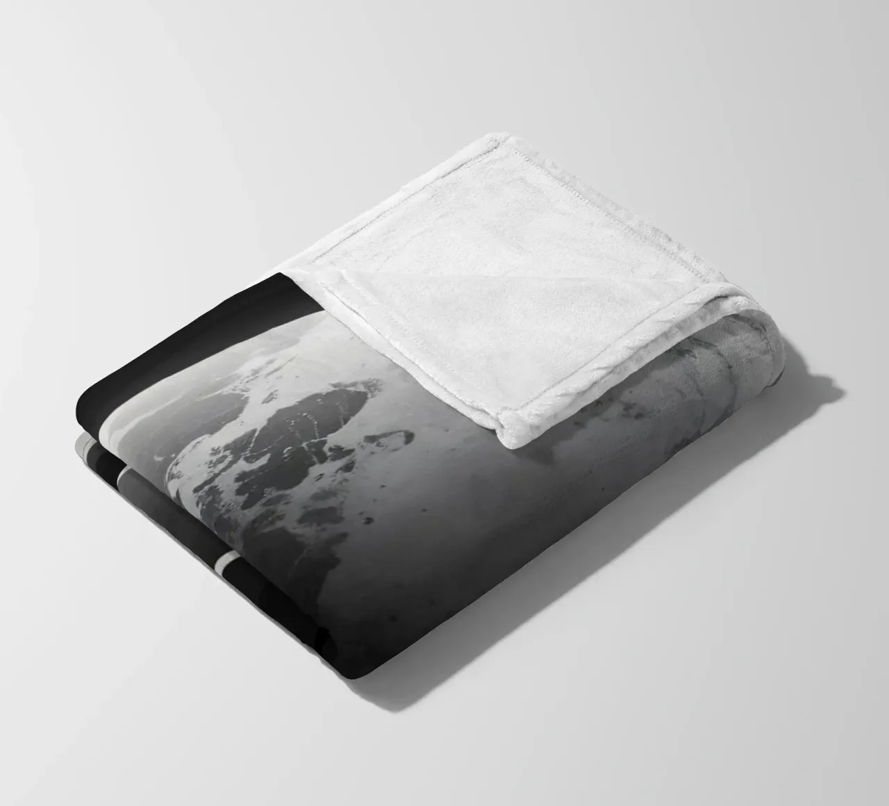 planet with rings hovering over a desolate landscape under a fleece blanket by DesignDoodle