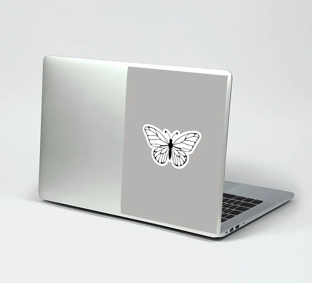 Illustration d'un papillon complexe en noir et blanc autocollant de DesignDoodle