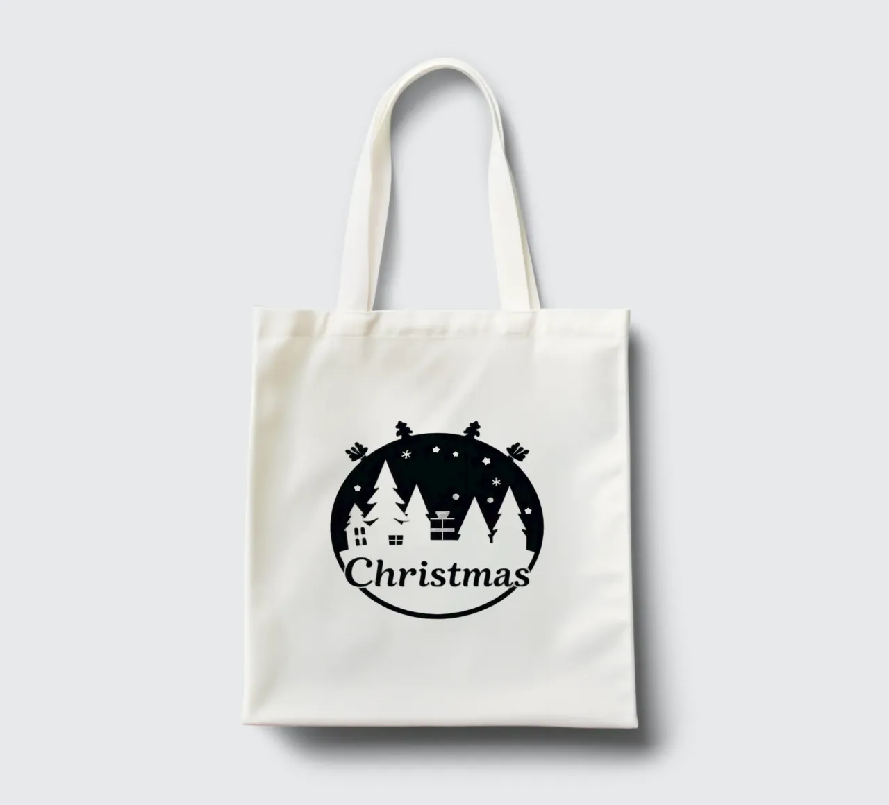 Christmas-themed silhouette of trees and presents tote bag by DesignDoodle