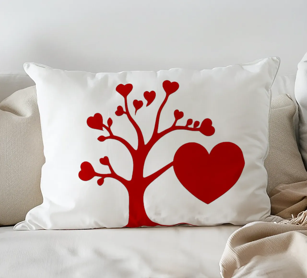 Un albero rosso vibrante, ornato di cuori, simboleggia l'amore. cuscino da DesignDoodle