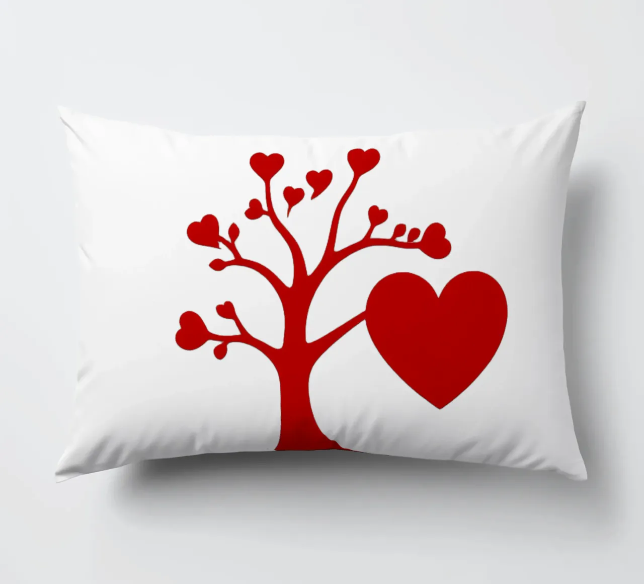 Un albero rosso vibrante, ornato di cuori, simboleggia l'amore. cuscino da DesignDoodle