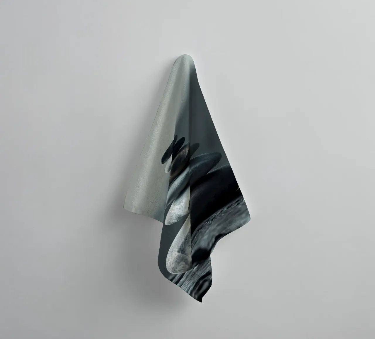 A tranquil stack of smooth river stones balances perfectly towel by DesignDoodle