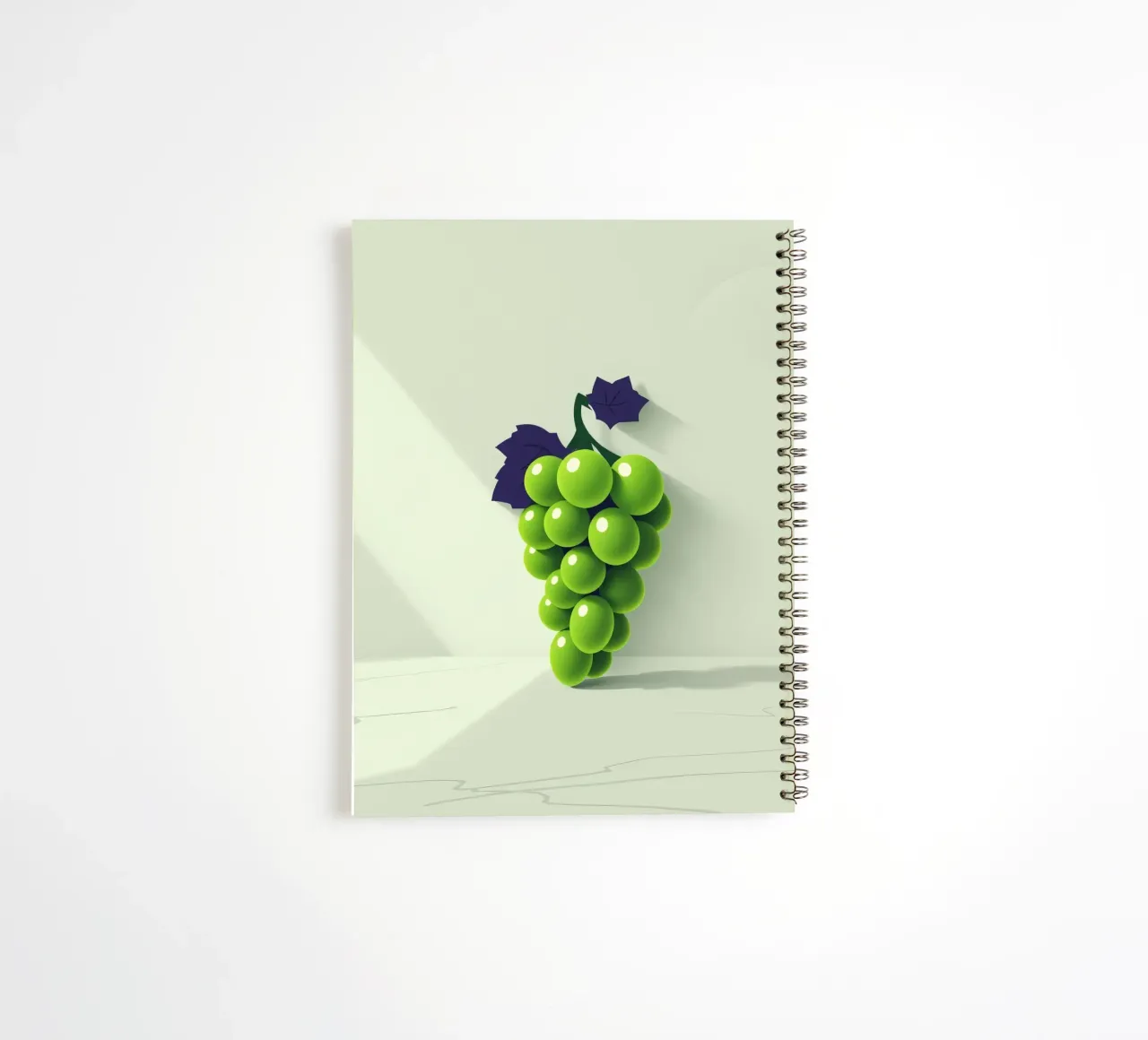 A cluster of green grapes casts soft shadows spiral notebook by DesignDoodle
