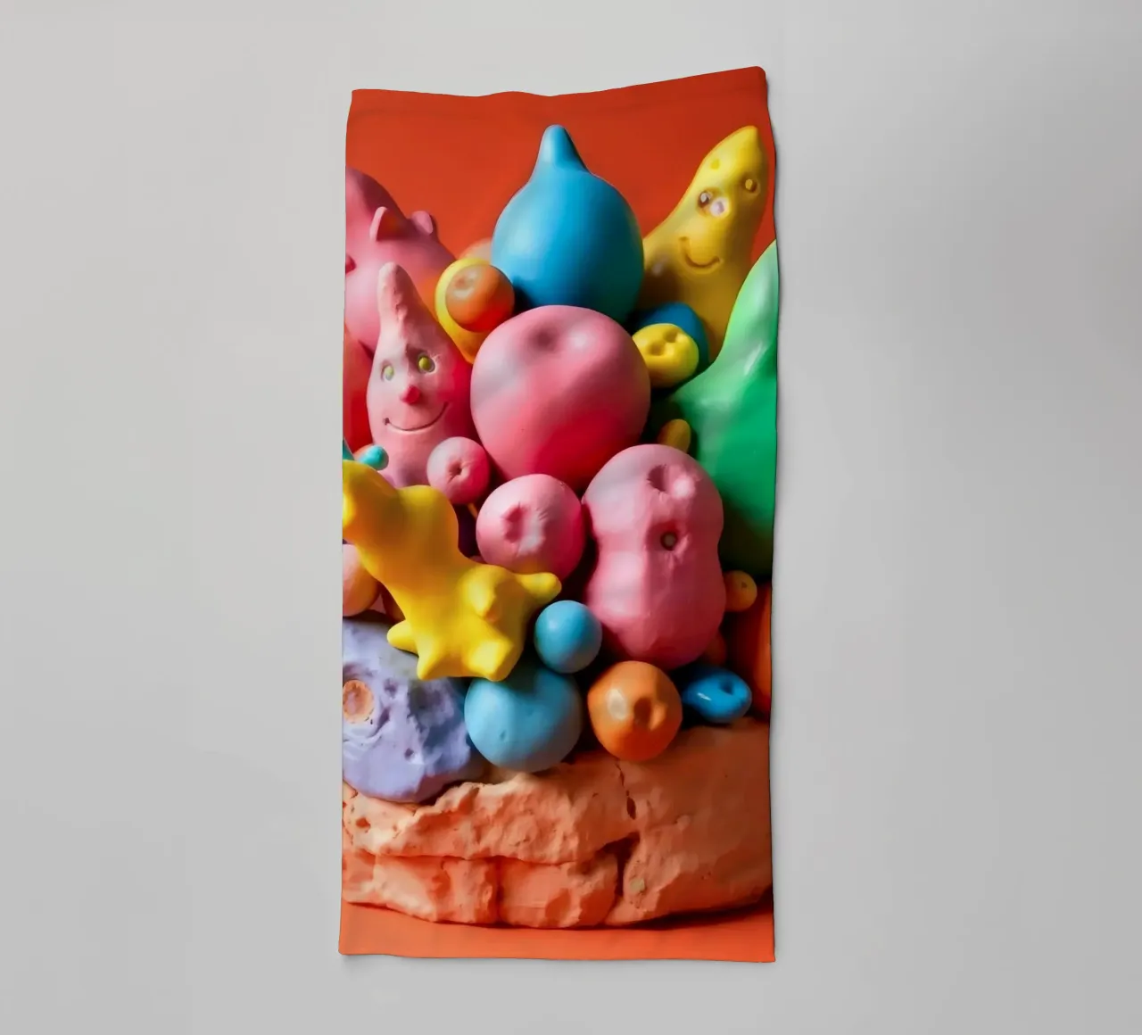Colorful assortment of playful shapes and characters towel by DesignDoodle