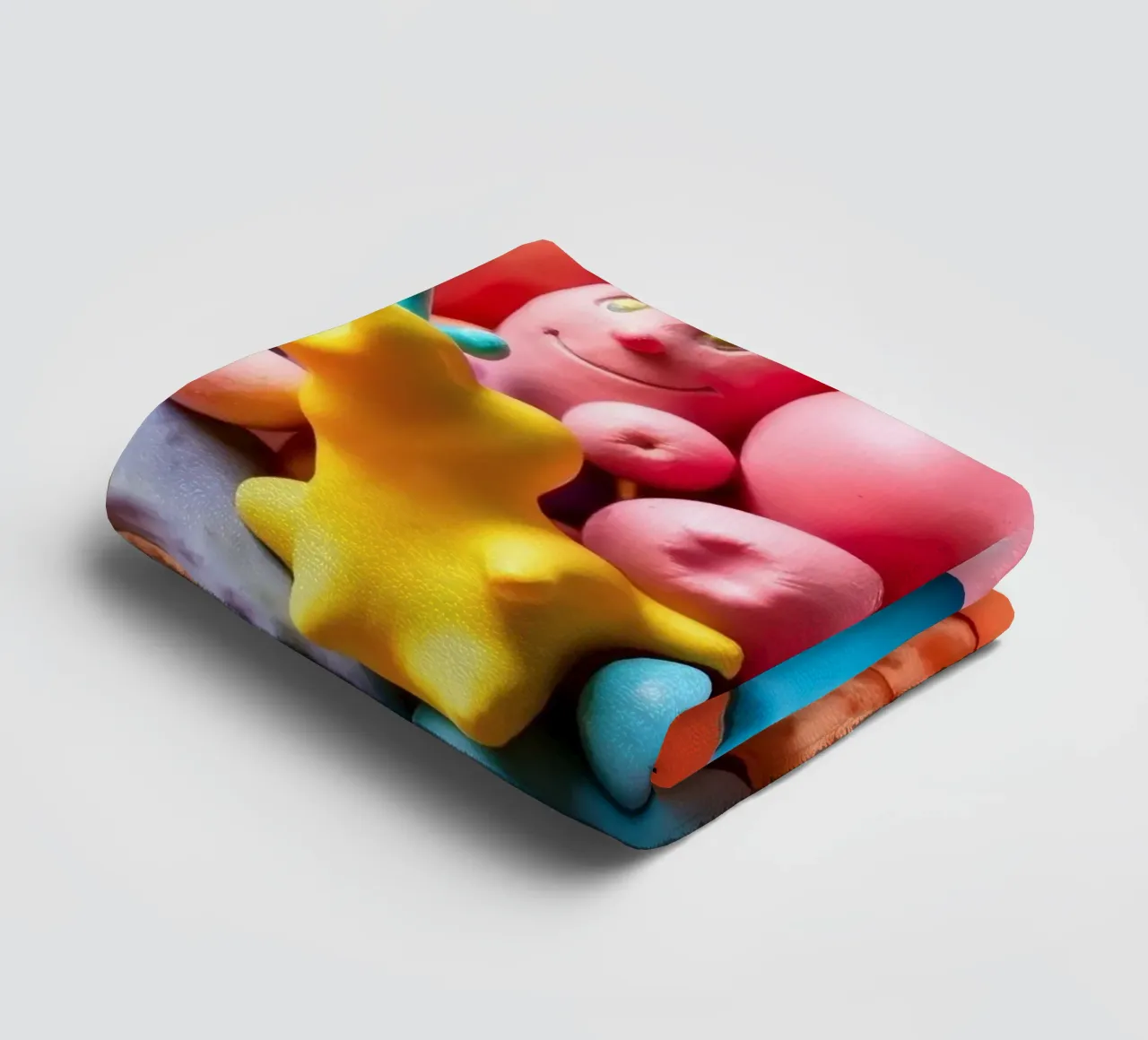 Colorful assortment of playful shapes and characters towel by DesignDoodle