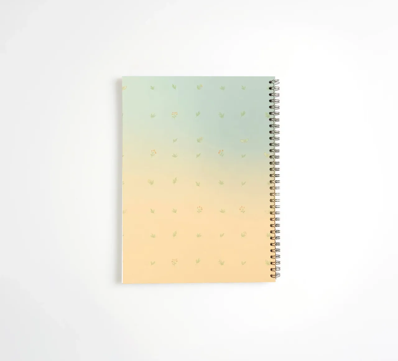 Softly colored background with delicate floral patterns spiral notebook by DesignDoodle