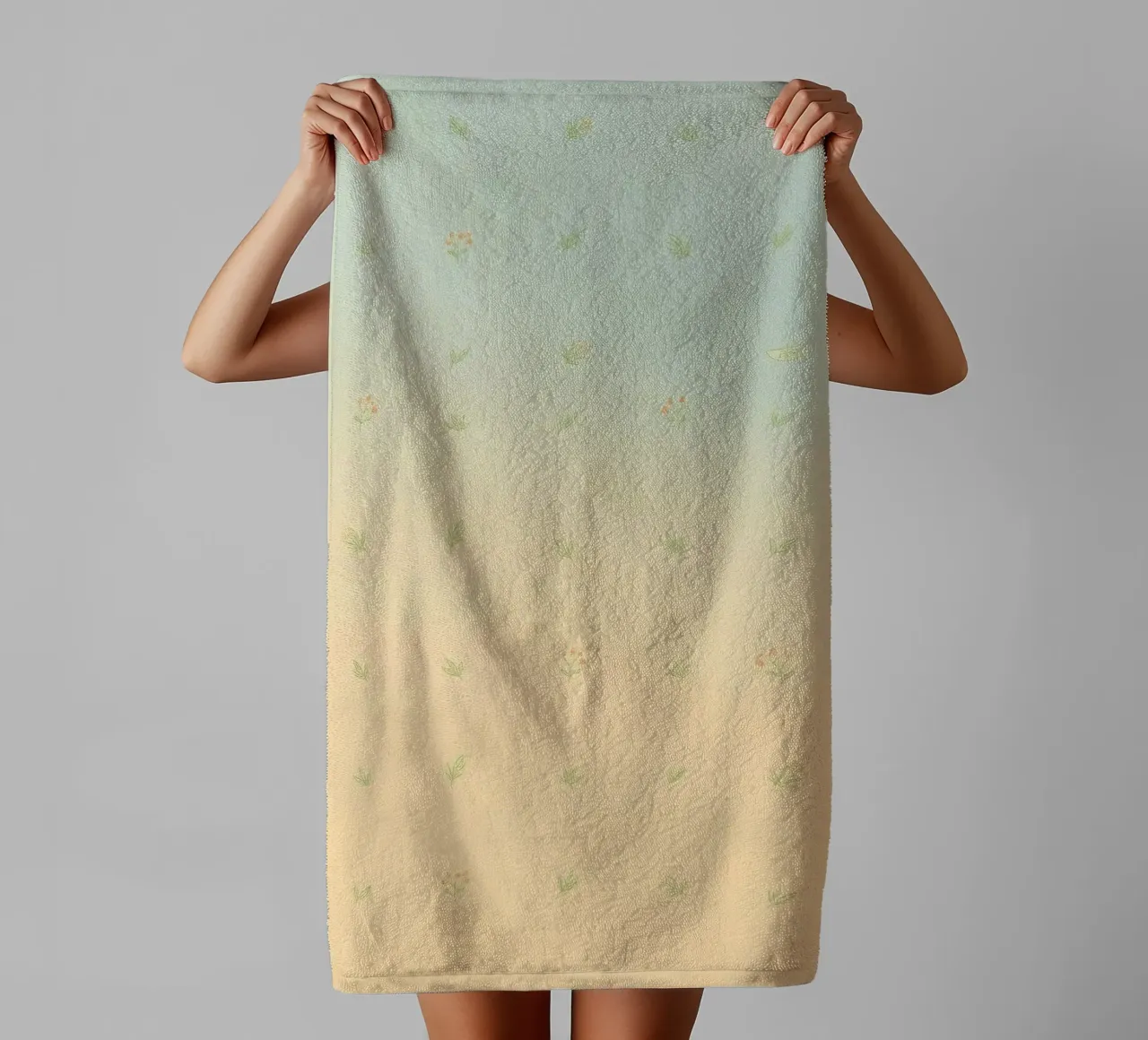 Softly colored background with delicate floral patterns towel by DesignDoodle