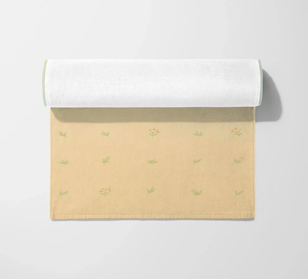 Softly colored background with delicate floral patterns beach towel by DesignDoodle