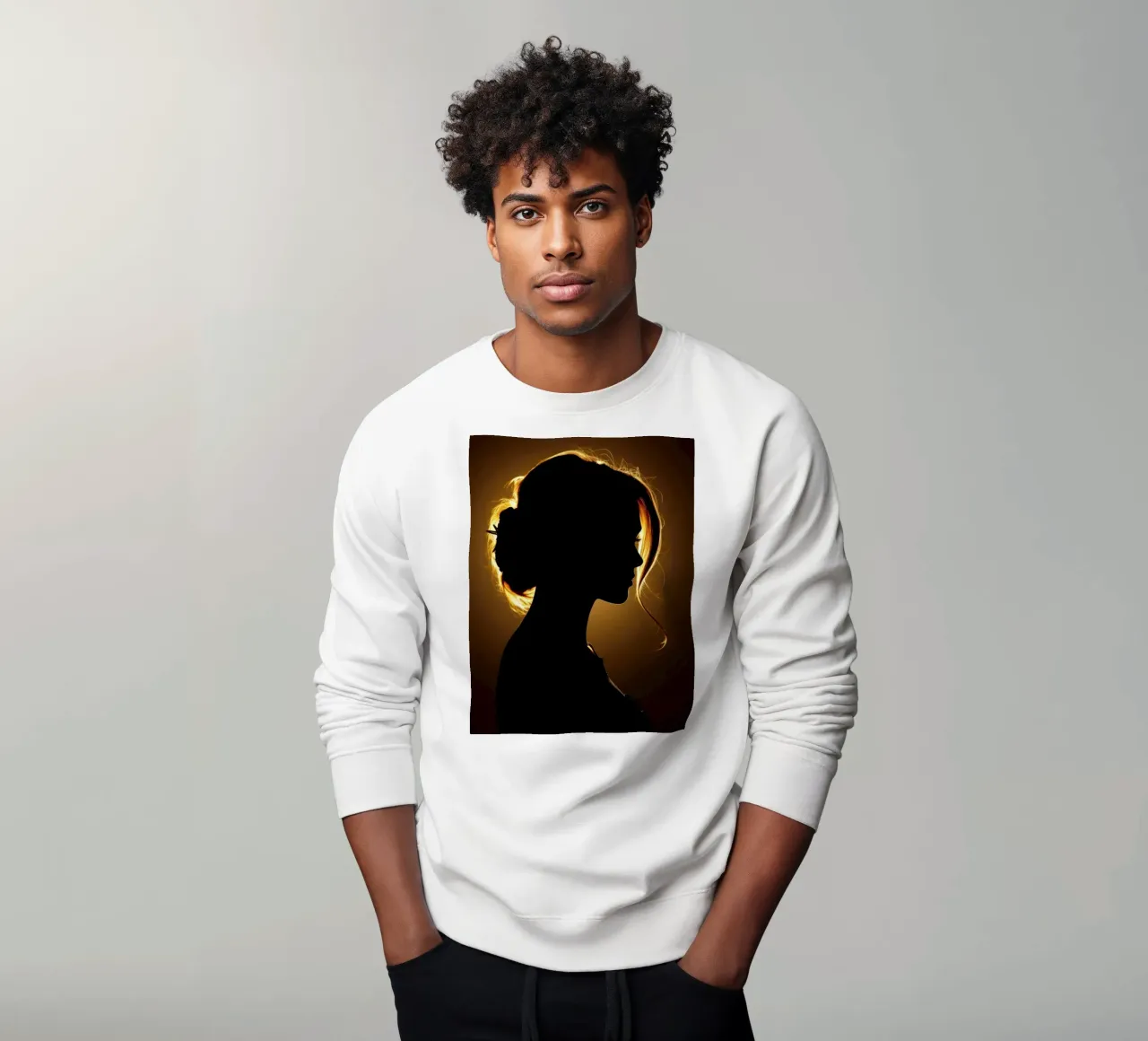 Silhouette di una donna con capelli fluenti illuminata da una luce calda felpa da DesignDoodle