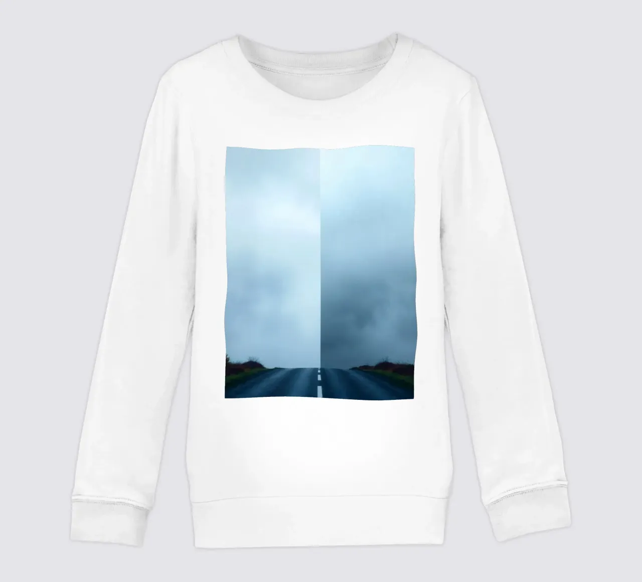 road leads into foggy distance with greenery on both sides kids sweatshirt by DesignDoodle